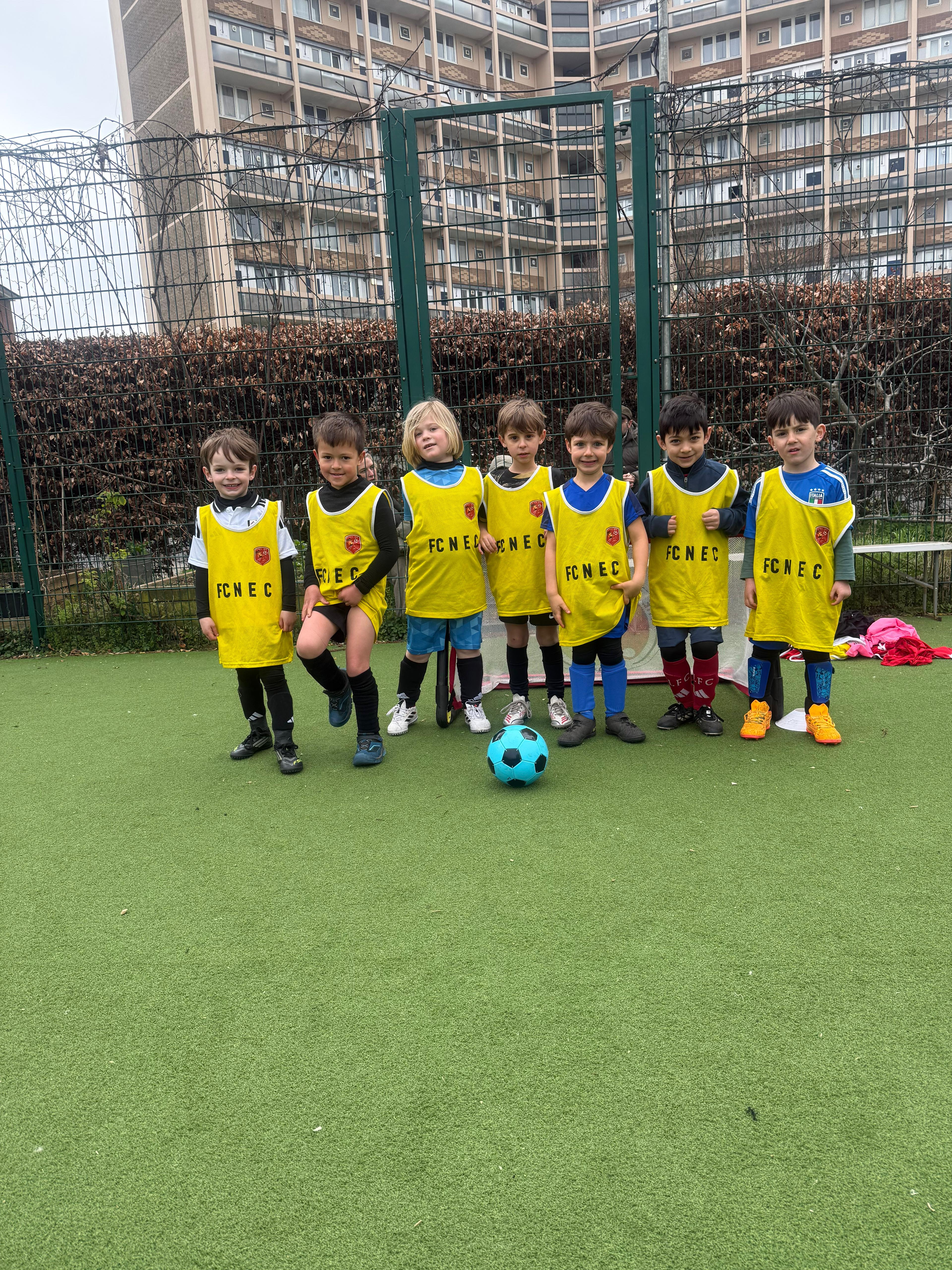 Academy session with players working across the pitch